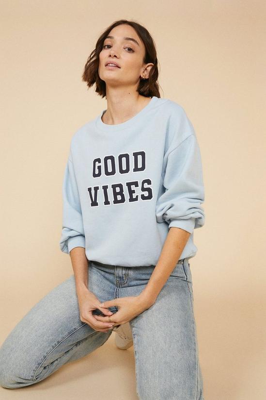 Oasis Good Vibes Varsity Sweatshirt 1