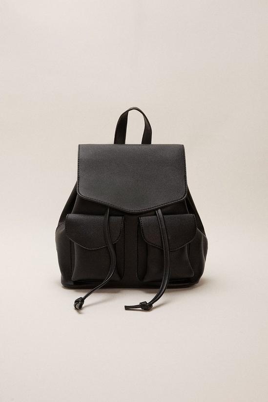 Oasis Tassel Double Pocket Backpack 1