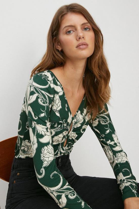 Oasis Floral Keyhole Front Top 2